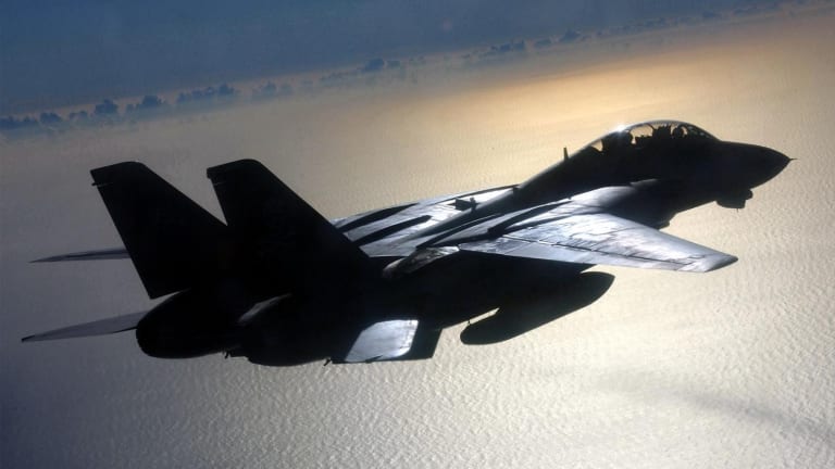 Fighter Showdown: Air Force F-22 Raptor vs. Iranian  F-14 Tomcat