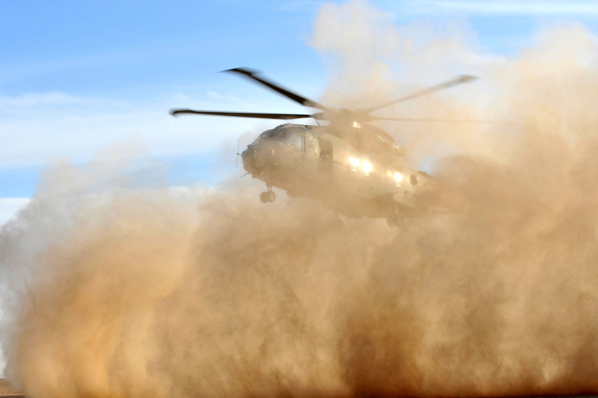 Merlin Helicopter Creates a 'Brownout' Dust Cloud Landing in Afghanistan MOD