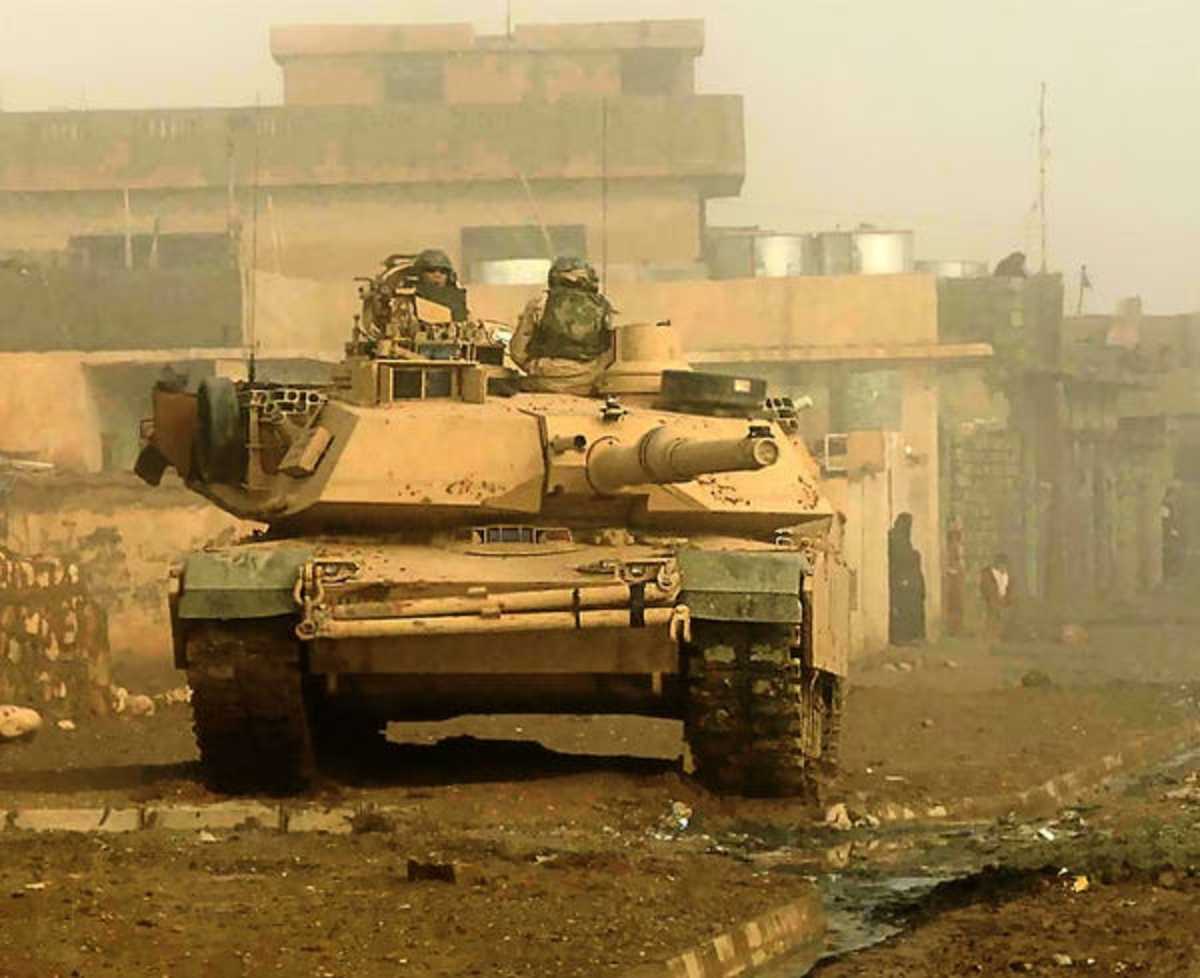 US Soldiers from 3rd Armored Cavalry Regiment in an M1 Abrams main battle tank in Biaj, Iraq, 