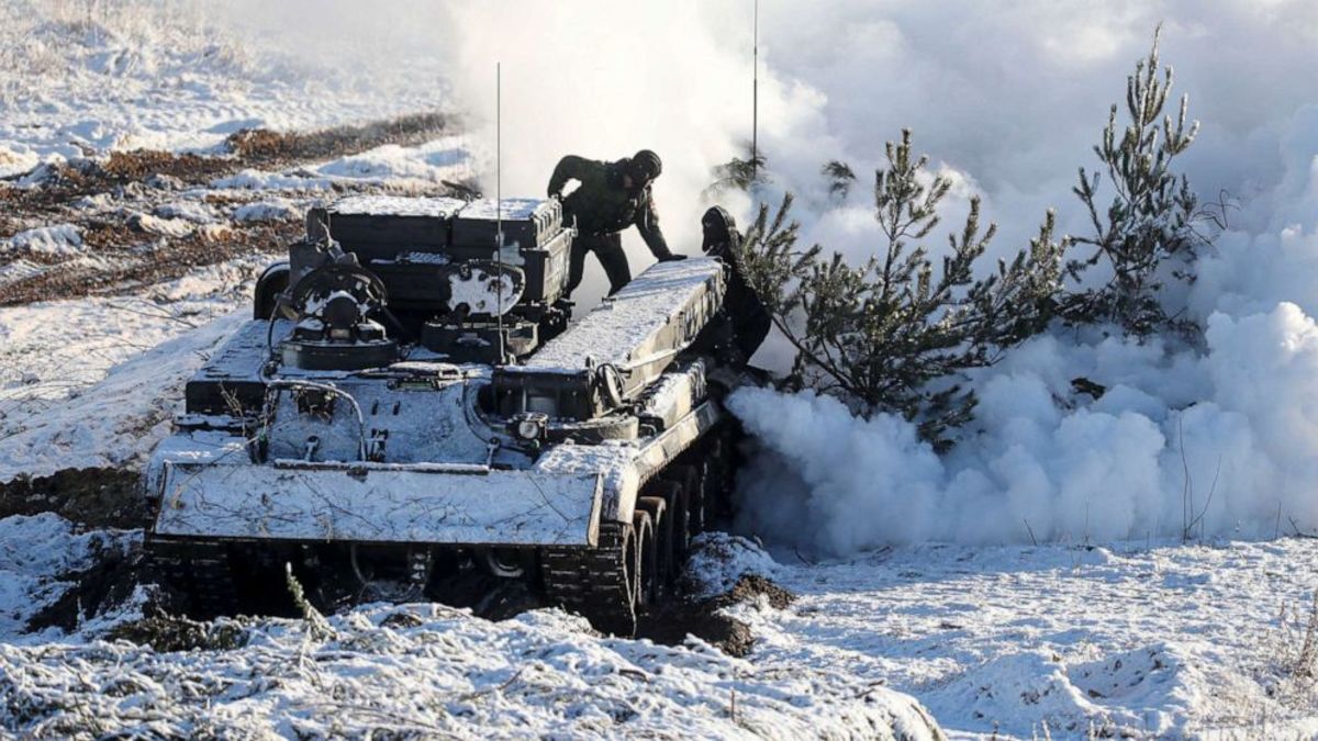 Soldiers work with their military vehicle at the Gozhsky training ground during the Union Courage-2022 Russia-Belarus military drills in Belarus. Russia has massed troops near the Ukraine border and has sent troops to exercises in neighboring Belarus, Feb. 12, 2022.