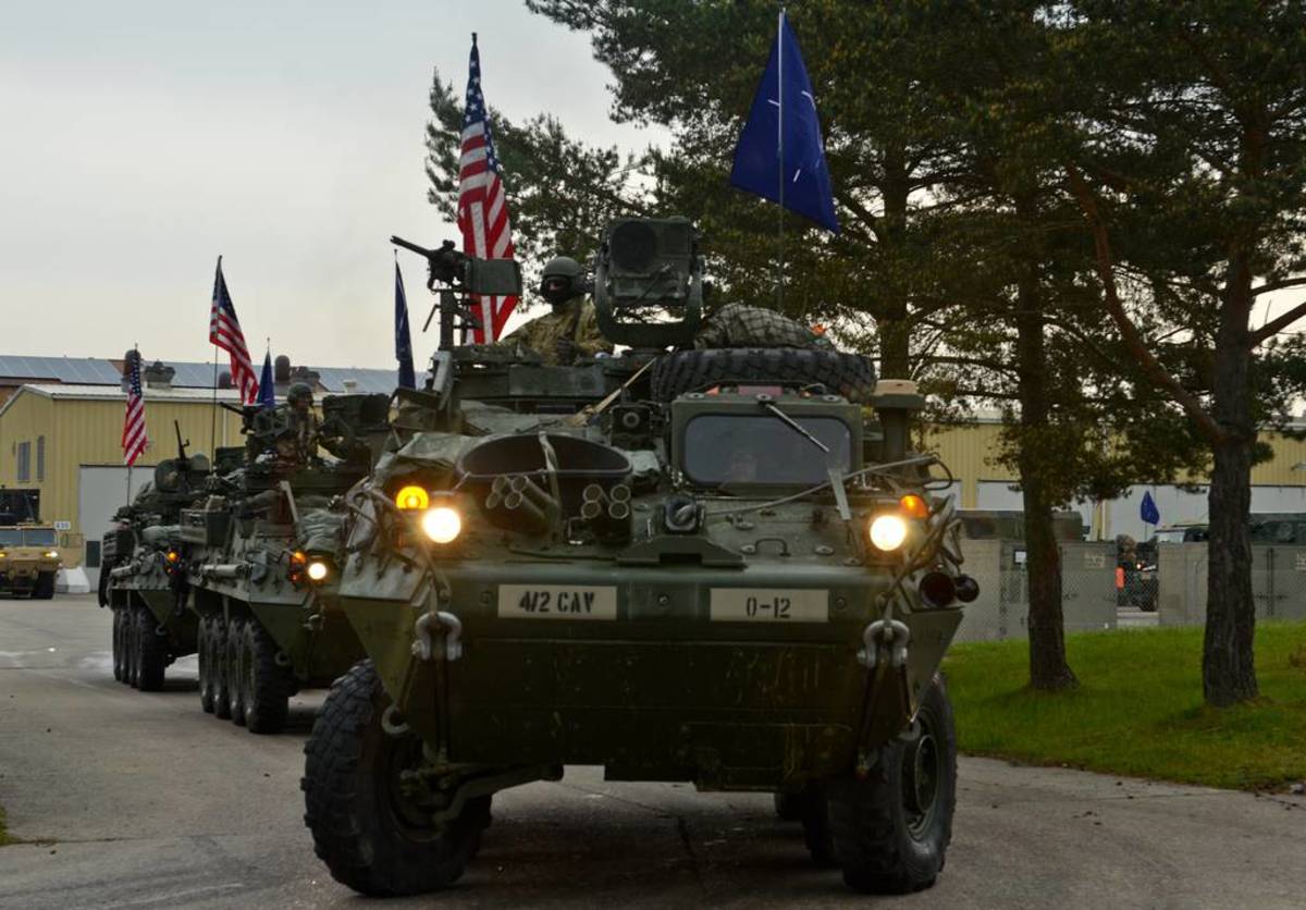 Soldiers of 2nd Cavalry Regiment roll out of the motor pool to begin their tactical road march in Stryker Combat Vehicles from Rose Barracks, Germany to Tapa Military Training Area, Estonia, May 27. On their journey approximately 1,400 Soldiers, in 400 vehicles, will be covering over 2,200 kilometers, through six countries. Dragoon Ride is conducted to validate our partnering allies’ abilities to assemble forces rapidly, deploy them on short notice and improve the ability to shoot, move and communicate as a multinational allegiance. (U.S. Army photo by Sgt. Caitlyn Byrne, 10th Press Camp Headquarters)