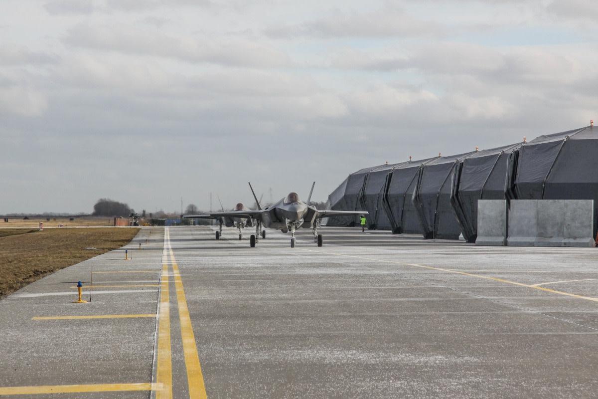 Two U.S. Air Force F-35 Lightning II aircraft arrive at Siauliai Air Base, Lithuania, Feb. 24, 2022. Aircraft and crews will work closely with Allies in the Black Sea region to reinforce regional security during the current tensions caused by Russia. (Courtesy Photo from Lithuanian Air Force)