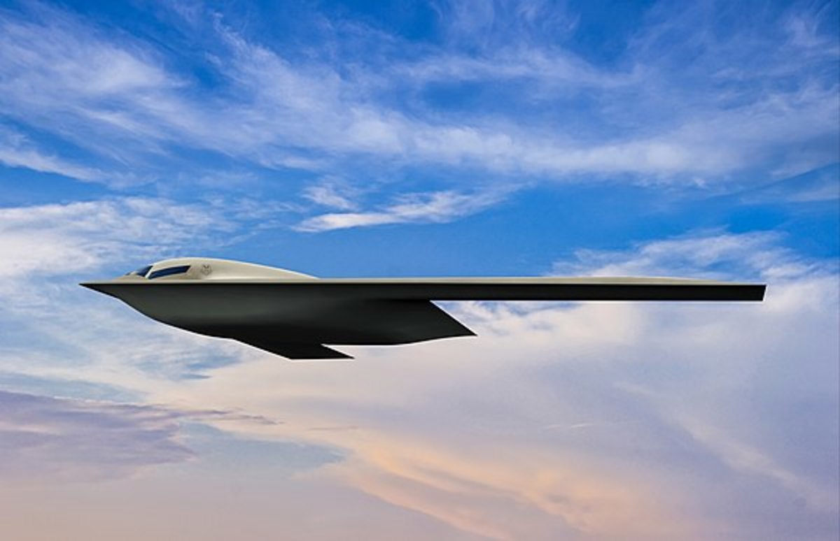 Shown is a B-21 Raider artist rendering graphic. The rendering highlights the future stealth bomber with Edwards Air Force Base, Calif., as the backdrop. Designed to perform long range conventional and nuclear missions and to operate in tomorrow’s high end threat environment, the B-21 will be a visible and flexible component of the nuclear triad. (U.S. Air Force graphic). This is the third USAF rendering of the B-21 Raider. Note changes in the windshield from previous official renderings.