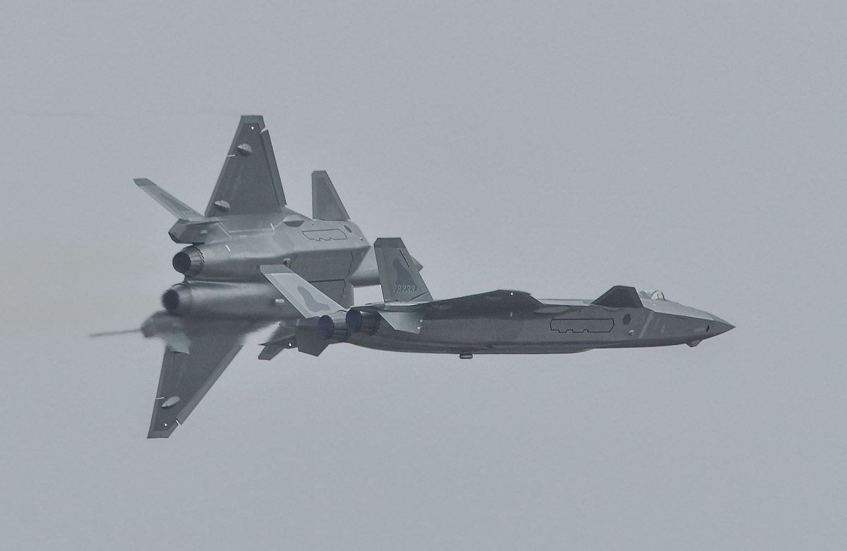 Two J-20 fighters breaking formation