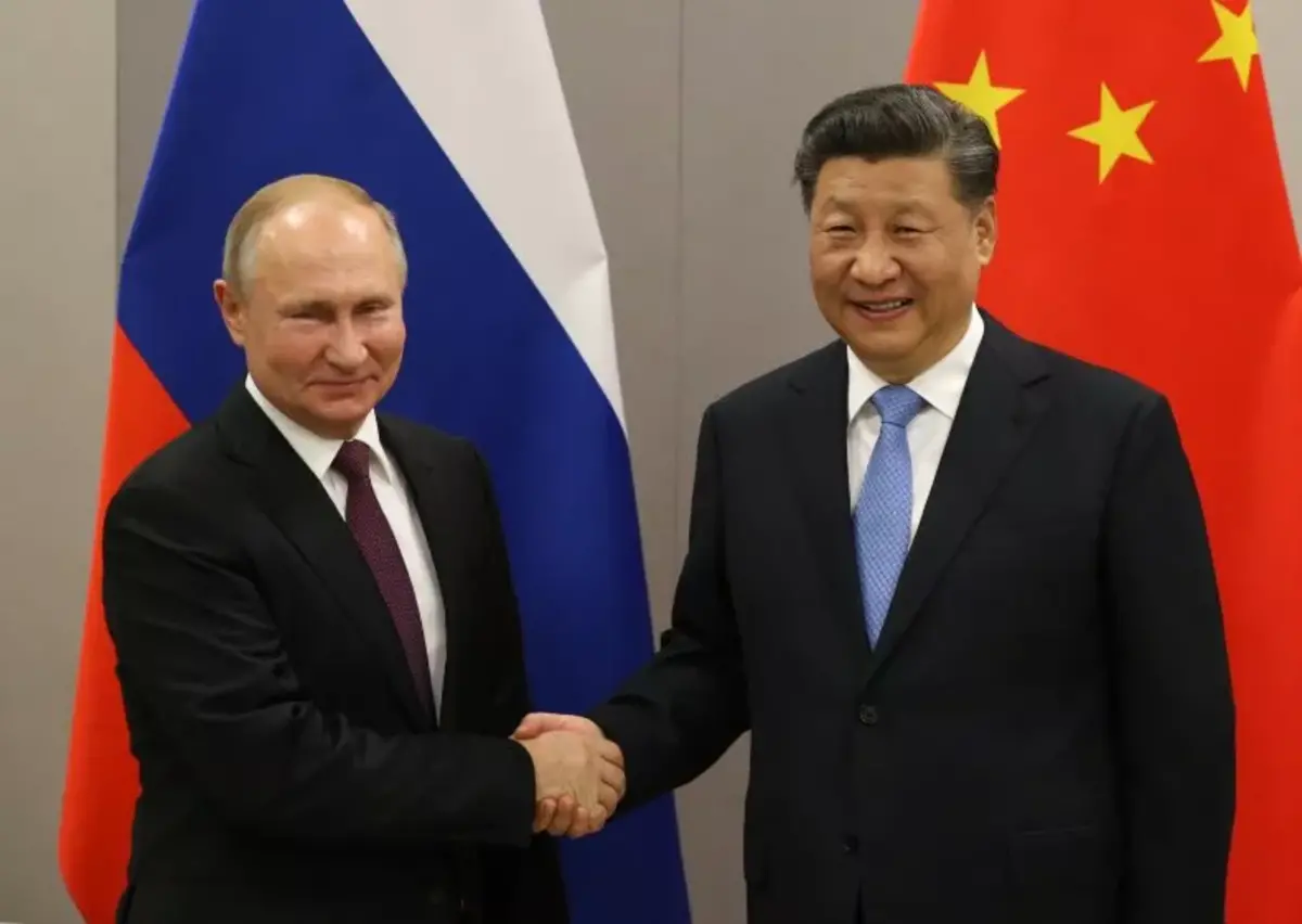Russia and China reaffirmed their commitment to not use nuclear weapons "first" and not to fire ballistic missiles at each other. Russian President Vladimir Putin, left, greets Chinese President Xi Jinping during their bilateral meeting on Nov. 13, 2019, in Brasilia, Brazil.
