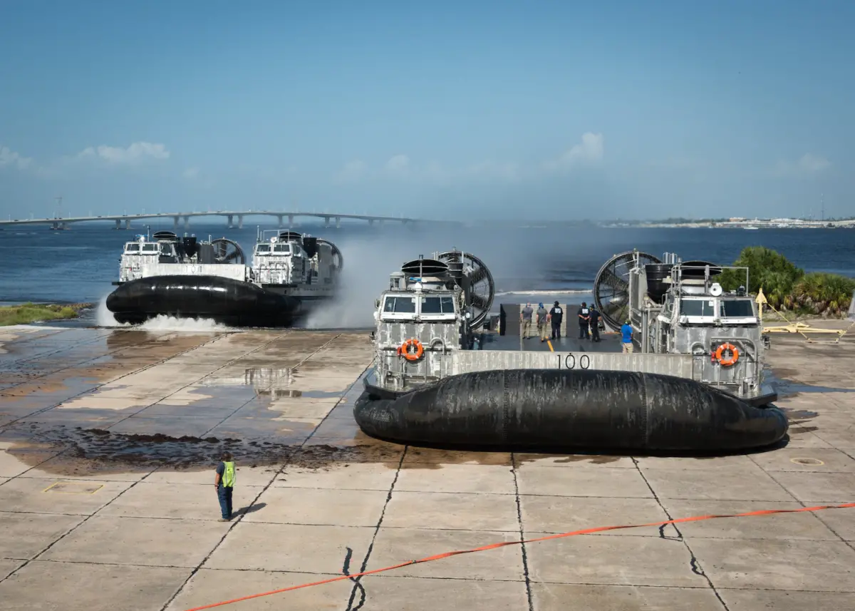 PANAMA CITY, Fla. - The Navy’s newest Landing Craft Air Cushion (LCAC) hovercraft arrived at Naval Surface Warfare Center Panama City Division Sept. 2. The two craft, LCAC-100 and LCAC-101, were escorted by NSWC PCD’s research, development, test and evaluation craft, LCAC-91.This effort is part of the Navy’s Ship to Shore Connector program which calls for the procurement of 72 craft with a separate craft serving as a test and training craft.