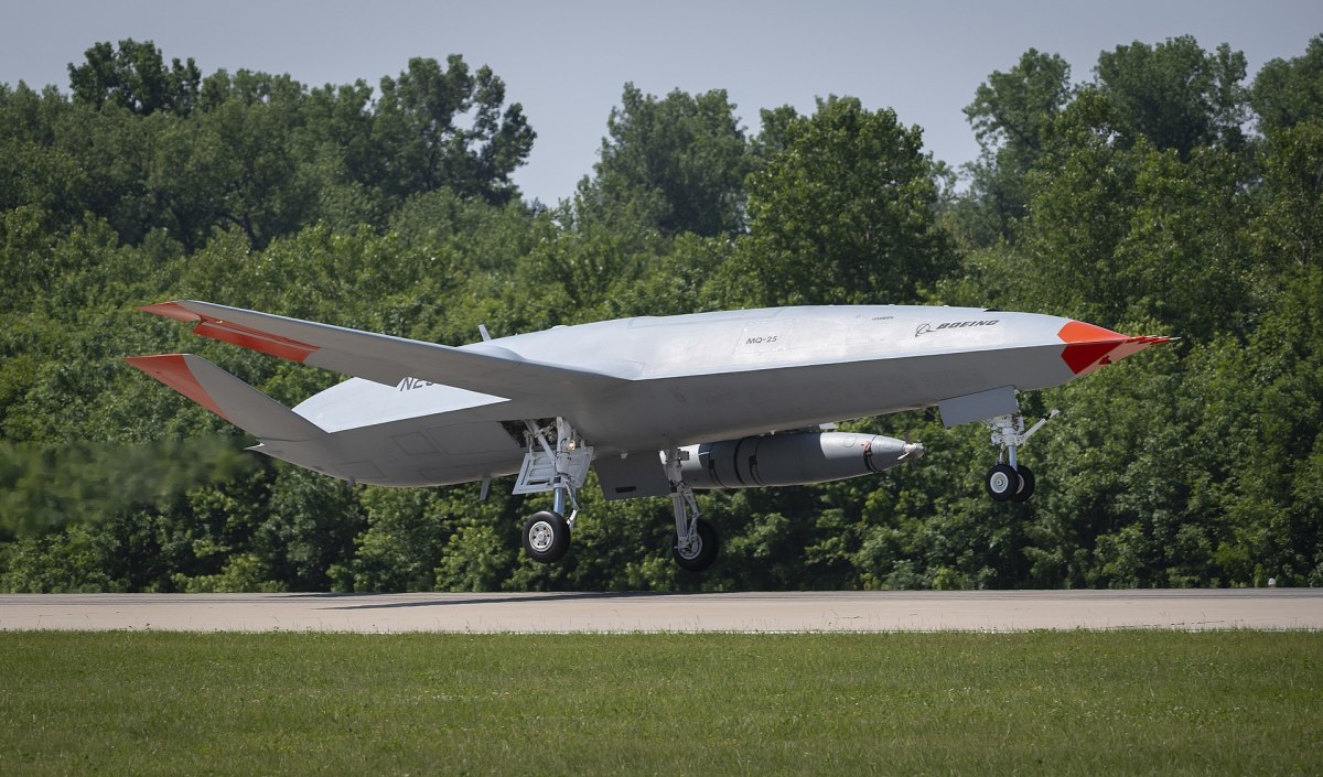 MASCOUTAH, Ill. (June 4, 2021) An unmanned Boeing MQ-25 T1 Stingray test aircraft takes off from MidAmerica Airport in Mascoutah, Illinois to conduct an aerial refueling test with a manned F/A-18 Super Hornet, June 4, 2021. This successful flight demonstrated that the MQ-25 StingrayÊcan fulfill its tanker mission using the NavyÕs standard probe-and-drogue aerial refueling method. Testing with the unmanned MQ-25 T1 Stingray will continue over the next several months. The MQ-25A Stingray will be the worldÕs first operational carrier-based unmanned aircraft and provide critical aerial refueling and intelligence, surveillance and reconnaissance capabilities that greatly expand the global reach, operational flexibility and lethality of the carrier air wing and carrier strike group. (U.S. Navy photo courtesy of Boeing)