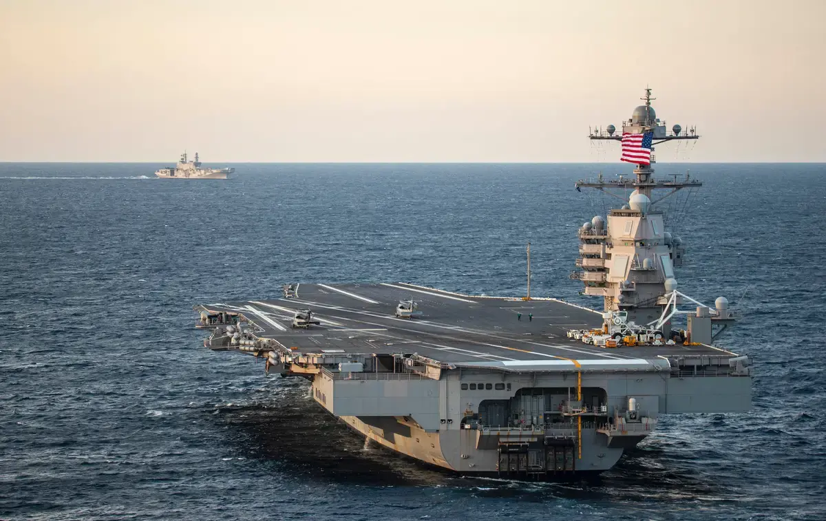 US Navy aircraft carrier USS Gerald R. Ford and Italian aircraft carrier ITS Cavour in the Atlantic Ocean, March 20, 2021. 