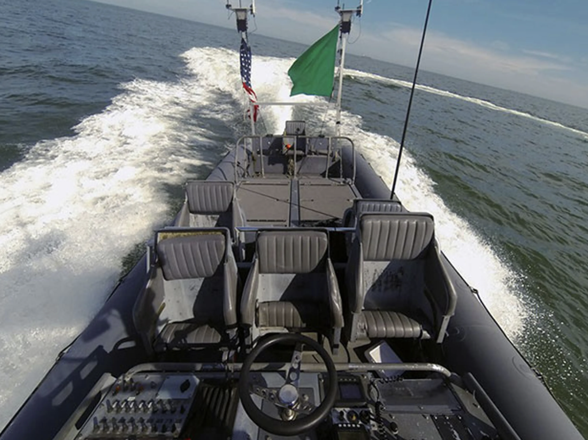 An unmanned boat operates autonomously during an U.S. Navy demonstration.