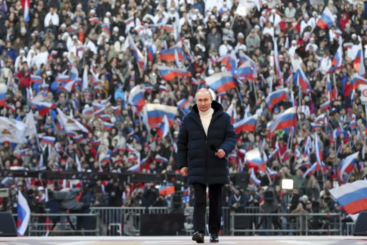 Russian President Vladimir Putin arrives in Moscow on March 18 to deliver a speech at a concert marking the eighth anniversary of Crimea’s reunification with Russia.