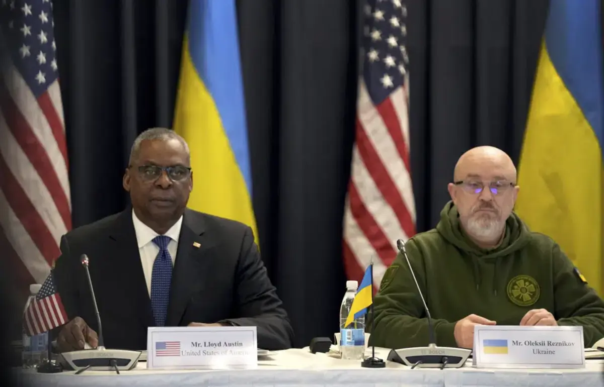 US Defense Secretary Lloyd Austin, left, and the Ukrainian participant Oleksii Reznikov, right, attend the meeting of the 'Ukraine Defense Contact Group' at Ramstein Air Base in Ramstein, Germany, Friday, Jan. 20, 2023. Defense leaders are gathering at Ramstein Air Base in Germany Friday to hammer out future military aid to Ukraine, amid ongoing dissent over who will provide the battle tanks that Ukrainian leaders say they desperately need(AP Photo/Michael Probst)