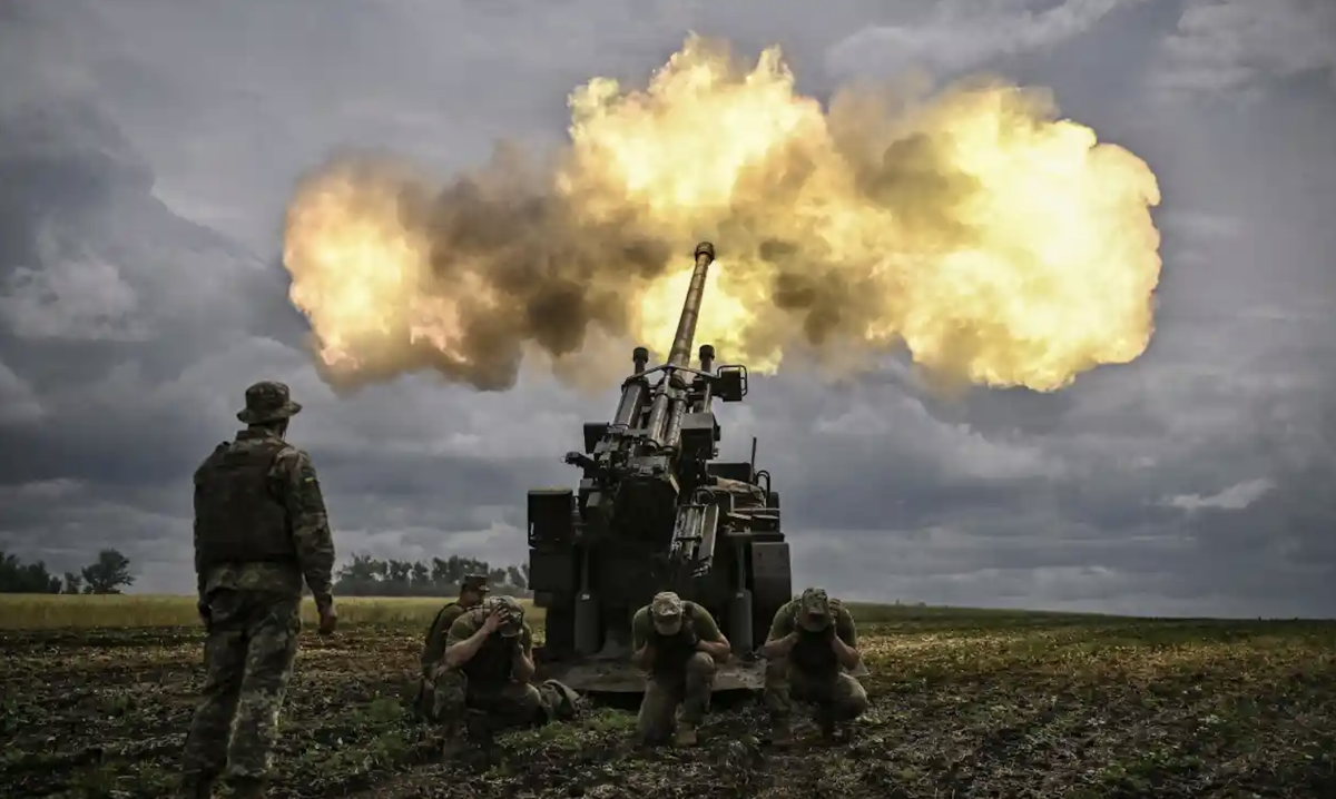 Ukrainian servicemen fire with a French self-propelled 155 mm/52-calibre gun Caesar in the eastern Ukrainian region of Donbas. Photograph: Aris Messinis/AFP/Getty Images