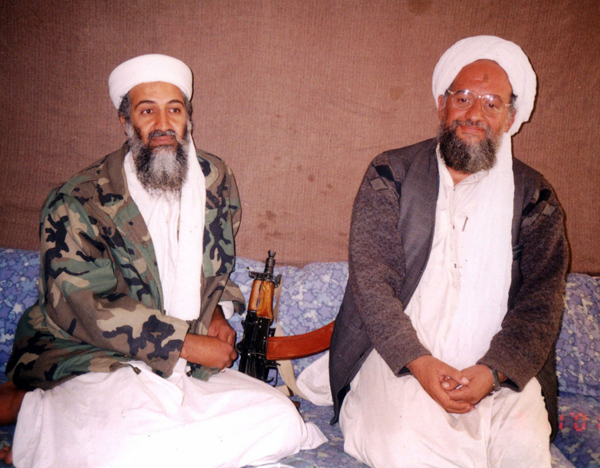 Osama bin Laden (left) sits with his adviser Ayman al-Zawahri, an Egyptian linked to the al Qaeda network. | Visual News/Getty Images