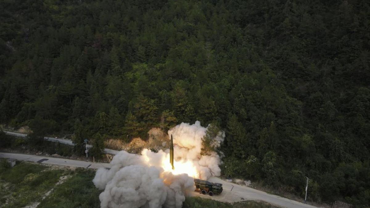 In this photo released by China's Xinhua News Agency, a projectile is launched at an unspecified location in China during long-range live-fire drills by the rocket force of the Eastern Theater Command of the Chinese People's Liberation Army targeting maritime areas east of Taiwan, Thursday, Aug. 4, 2022. China conducted "precision missile strikes" Thursday in waters off Taiwan's coasts as part of military exercises that have raised tensions in the region to their highest level in decades following a visit by U.S. House Speaker Nancy Pelosi. (Wang Yi/Xinhua via AP)